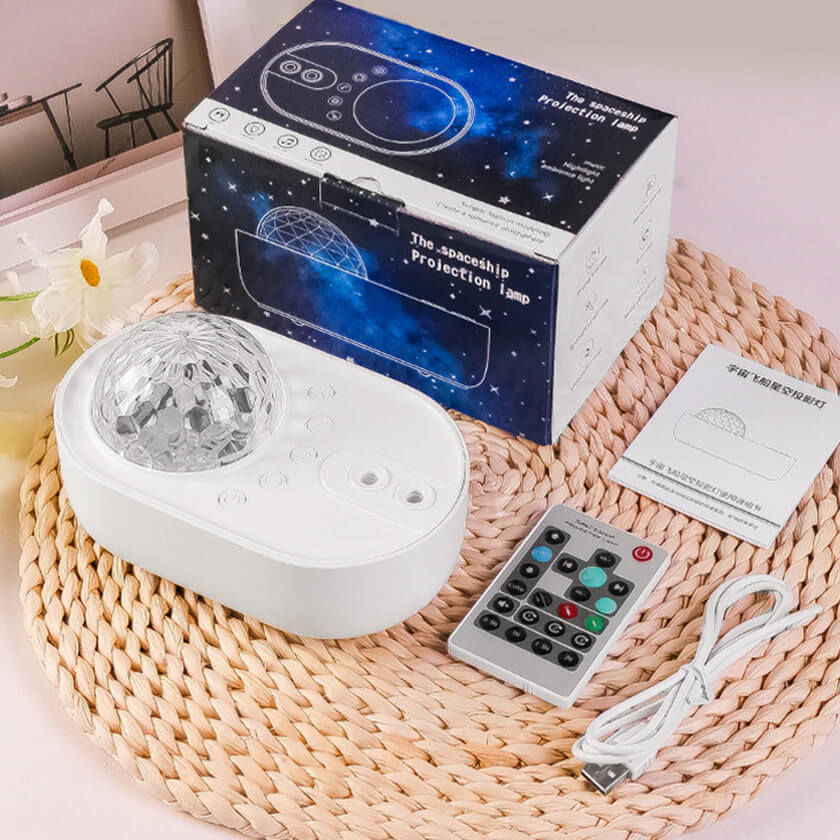 star sky projector avec sa télécommande et son cable USB